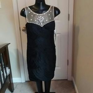 Black cocktail dress with beaded embellishments